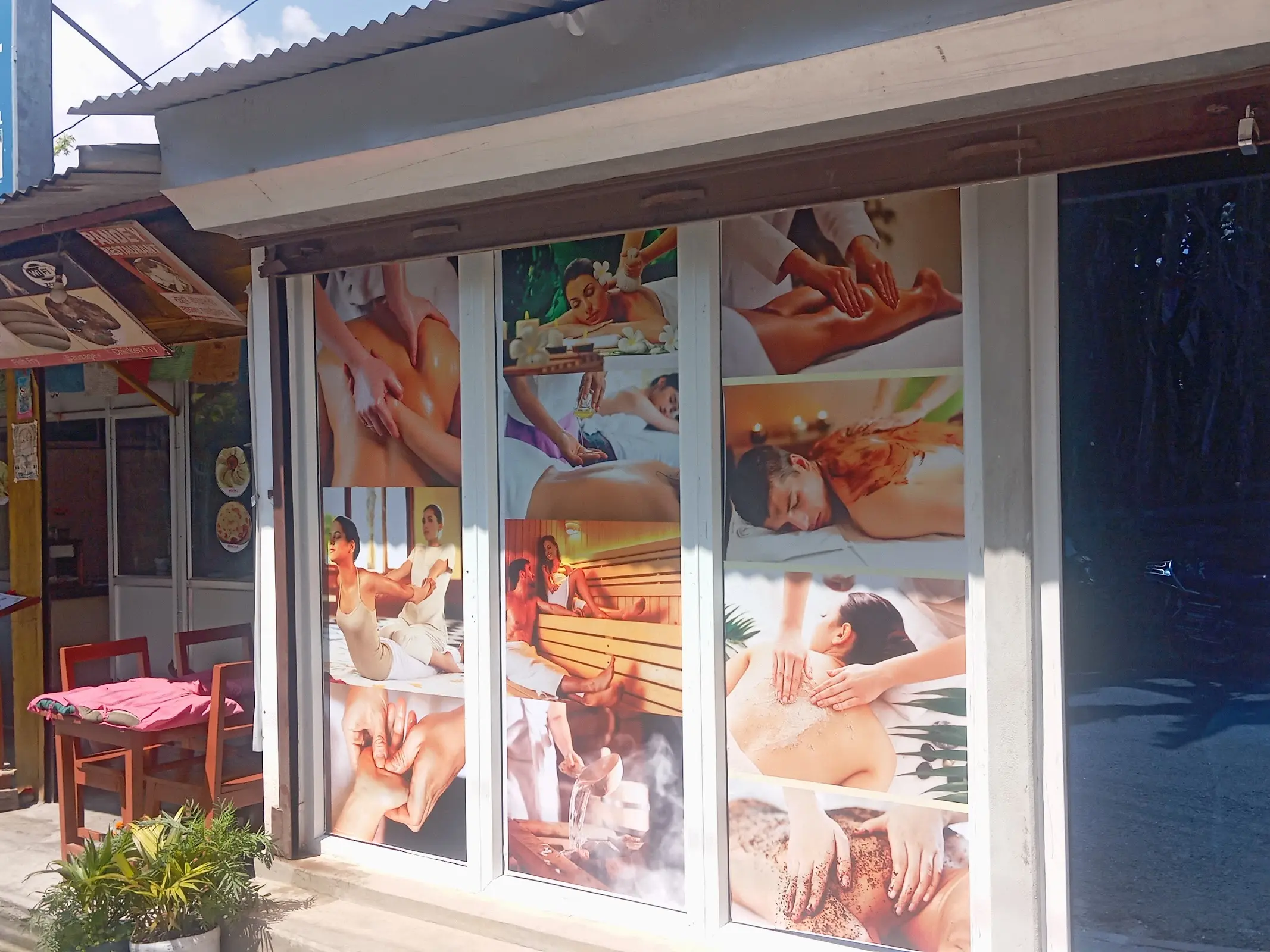 Six Sense Spa storefront on Lakeside Road, Pokhara, with massage menu in the windows