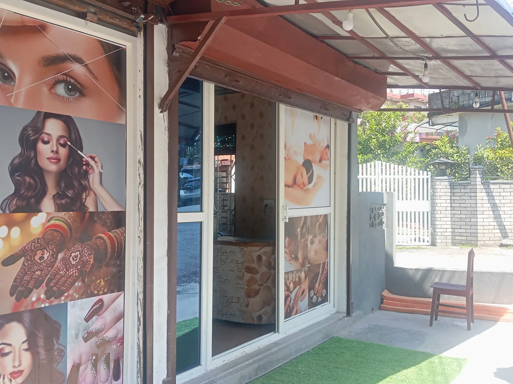 Six Sense Spa entrance with parlour services advertised in the front window